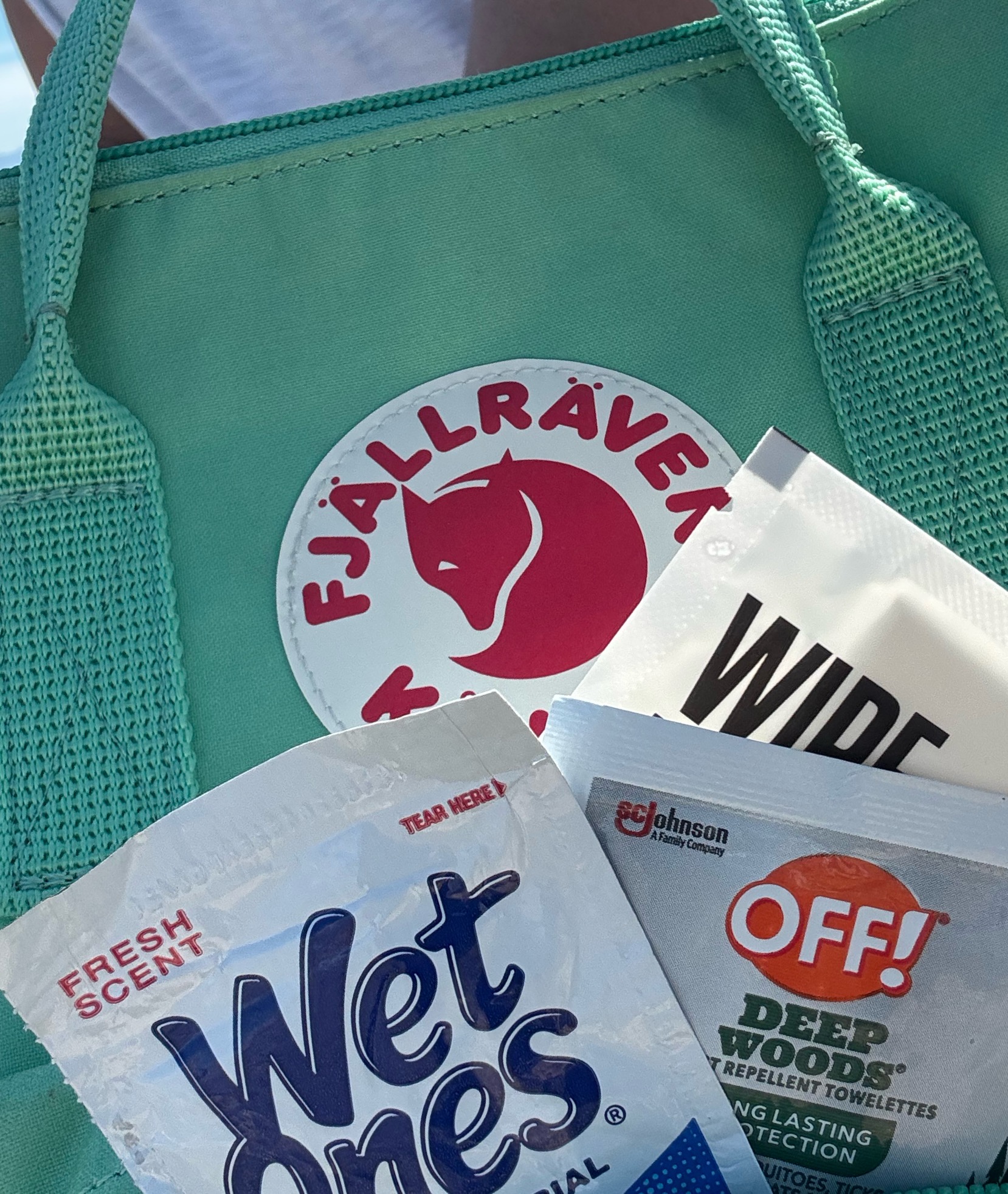 backpack with packets of convenience wipes for hiking